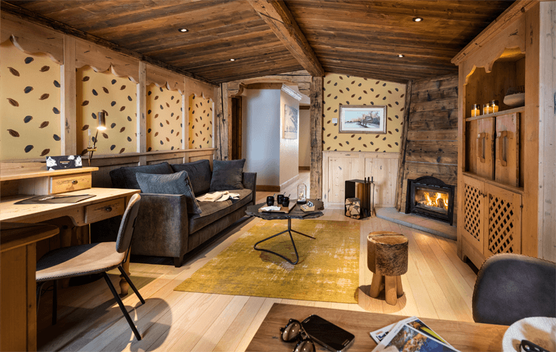 Geniet van je suite met open haard in het 5* Les Suites du Montana. © Les Etincelles
